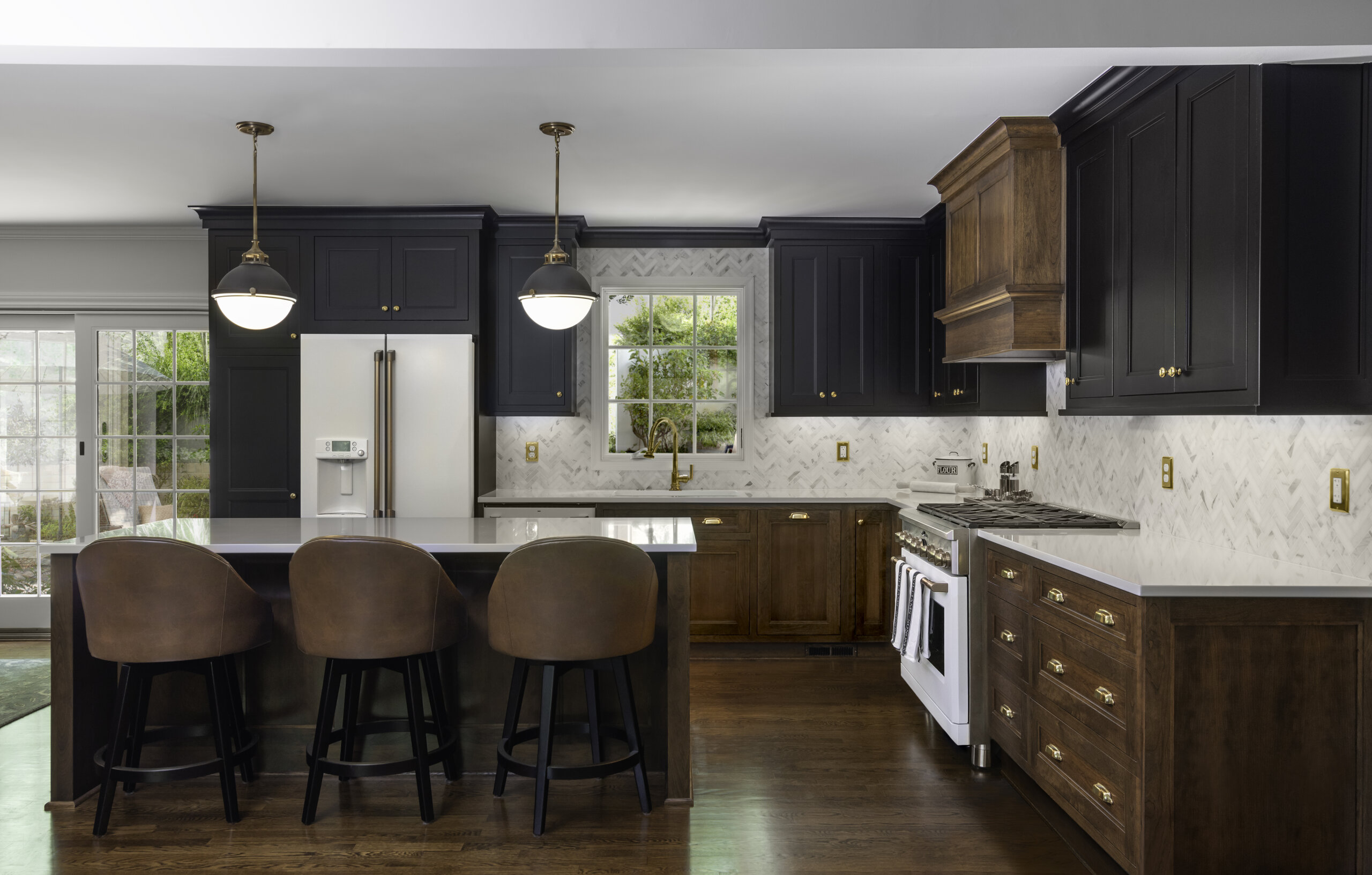 Check out these kitchen cabinet reviews with testimonies from homeowners on their remodel project with Dura Supreme Cabinetry. Hear the client’s cabinetry testimony about this beautiful black paint and cherry wood kitchen remodel project.